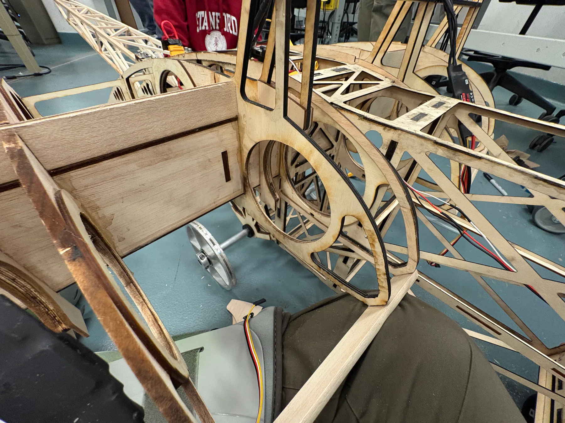 Close view of the aircraft's laser-cut plywood fuselage structure.